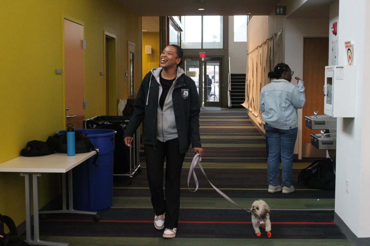 EXCEL Achieve Program Manager Tiauna Walker and her dog Honey Lynn