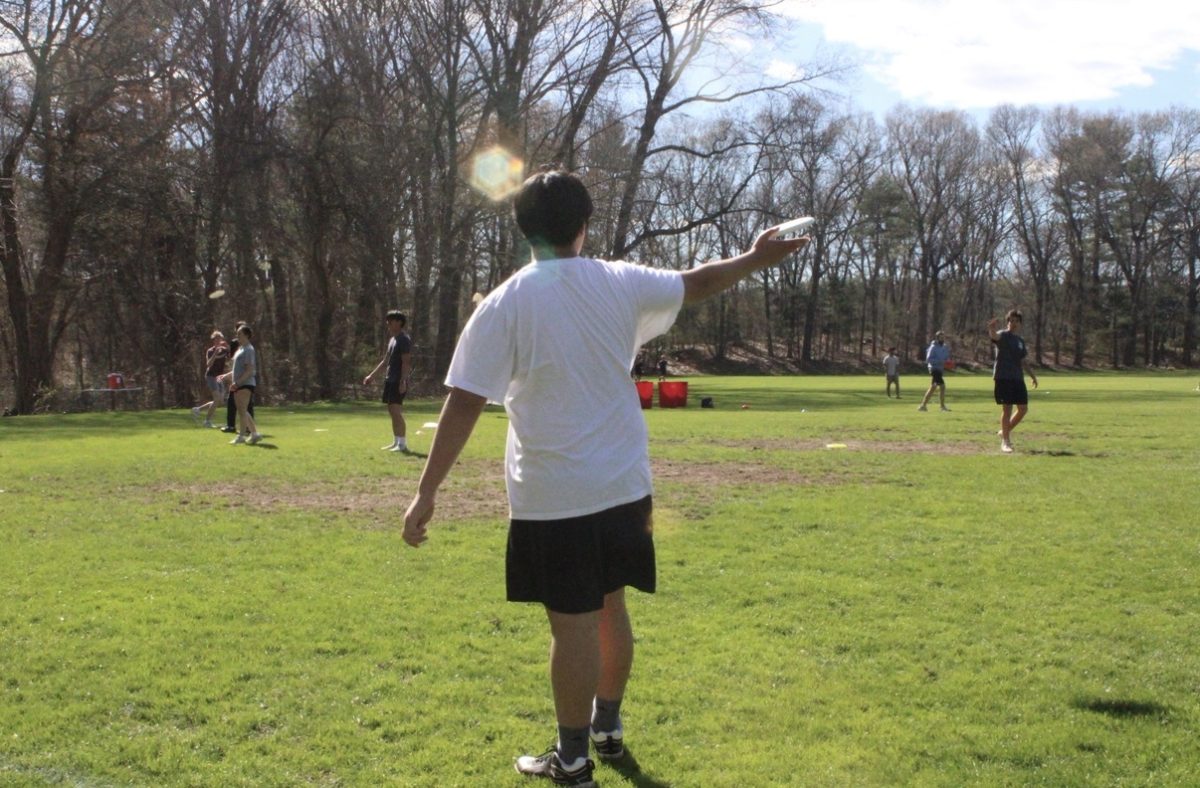 Nathan Nguyen (Class III) Throwing a Frisbee During Practice
