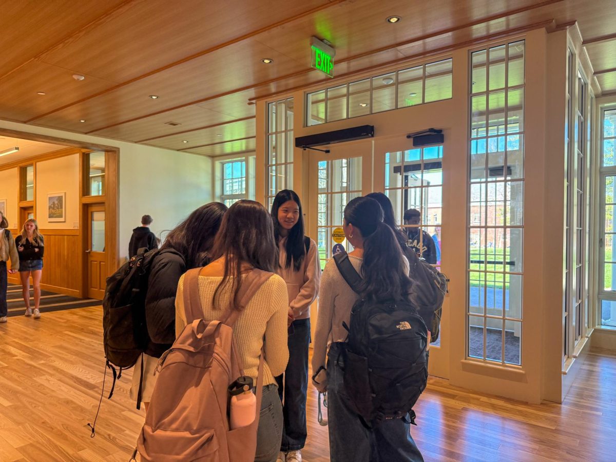 Students talking in a circle in Shattuck Schoolhouse