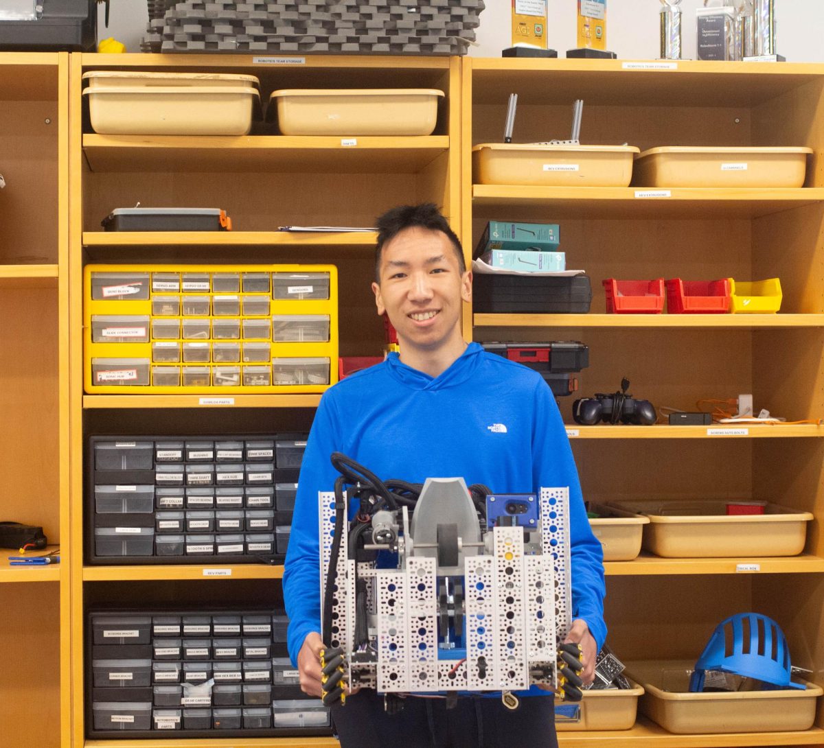 Jeffrey Liu (Class I) in the robotics laboratory